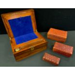 A Victorian mahogany folding writing box, brass shield escutcheon, 30cm wide, c.1860; other boxes