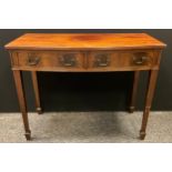 A 19th century mahogany bow front side table, fitted with two drawers, 84cm high, 107cm wide, c.1820