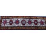 A Persian hand-made Heriz runner, 332cm x 96cm