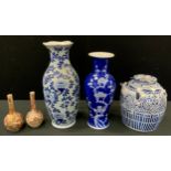 A 20th century Chinese blue and white jar and cover, 23cm high; a 20th century baluster vase,