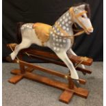 A 20th century Dapple-Grey painted rocking horse, stained pine base, 100cm tall (78cm to saddle) x