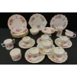 A Roya Crown Derby Posies pattern tea set, for six, including comport, bread plate, cake plate, milk