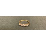 An early 20th century five stone diamond ring, old brilliant cut, 18ct gold shank, 1.8g