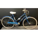 A BSA Granada lady’s bicycle, blue frame, three speed gears, 23 inch wheels, white wall tyres