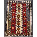 A Qashgai Kilim rug / carpet, hand-knotted in shades of cream, orange, pale blue and indigo, 202cm x
