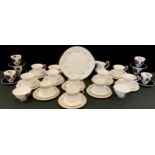 A Royal Albert Caress pattern tea set, for six; Masquerade coffee set. for six; four Belinda pattern