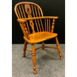 A Windsor chair, pierced vasular splat, crinoline stretcher