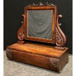A Victorian toilet or dressing table mirror, carved cresting and supports, square glass, bun feet,