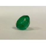 Loose Gemstone - a round brilliant cut natural emerald, 11.74ct, IGLI & I certificates