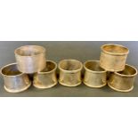 A matched set of four silver napkin rings, others various, 6.35oz, (7)