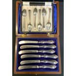 A set of six silver coffee spoons, Birmingham 1947; Victorian silver hafted butter knives,