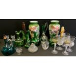 Glassware - a 19th century emerald glass globular decanter, reeded clear handle; other emerald