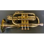 A Boosey and Hawkes 400 brass cornet with plated mouth piece, 33cm long, cased
