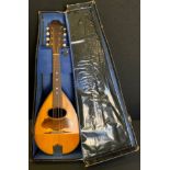 A Neapolitan bow back mandolin, 61cm long, cased