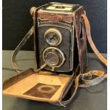 A Rollei Rolleicord Franke and Heidecke D.R.G.M. camera, in brown leather case