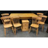 A large country cottage plank-top pine kitchen table, rounded rectangular top, turned legs, 182cm