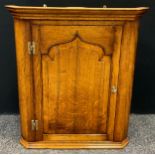 A Titchmarsh and Goodwin style oak corner cupboard, 82cm tall x 70.5cm wide x 36.5cm deep.