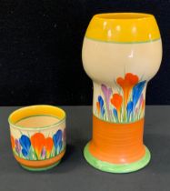 A Clarice Cliff Crocus pattern vase, 19cm high, printed mark; a similar small vase (faults)