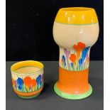 A Clarice Cliff Crocus pattern vase, 19cm high, printed mark; a similar small vase (faults)