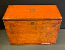A early 20th century oak stationary box, fall front writing surface, burgundy leather interior