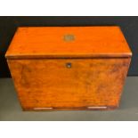 A early 20th century oak stationary box, fall front writing surface, burgundy leather interior