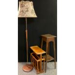 A Retro 1960's / 70's mahogany and brass standard lamp; a mid-20th century oak pot stand; an oak