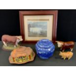 A Leonardo resin model, of Hereford cow, mahogany base; other cattle; a Maling ware North East Coast