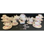 A Royal Crown Derby posies pattern tea set, for twelve inc teapot, milk and cream jugs; preserve pot