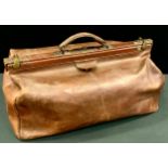 A large leather Gladstone bag, approx 30cm high, 54cm long, 25cm deep