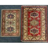 A Middle Eastern wool rug / prayer mat, knotted in tones of pale blue, indigo, red, and cream, 112cm