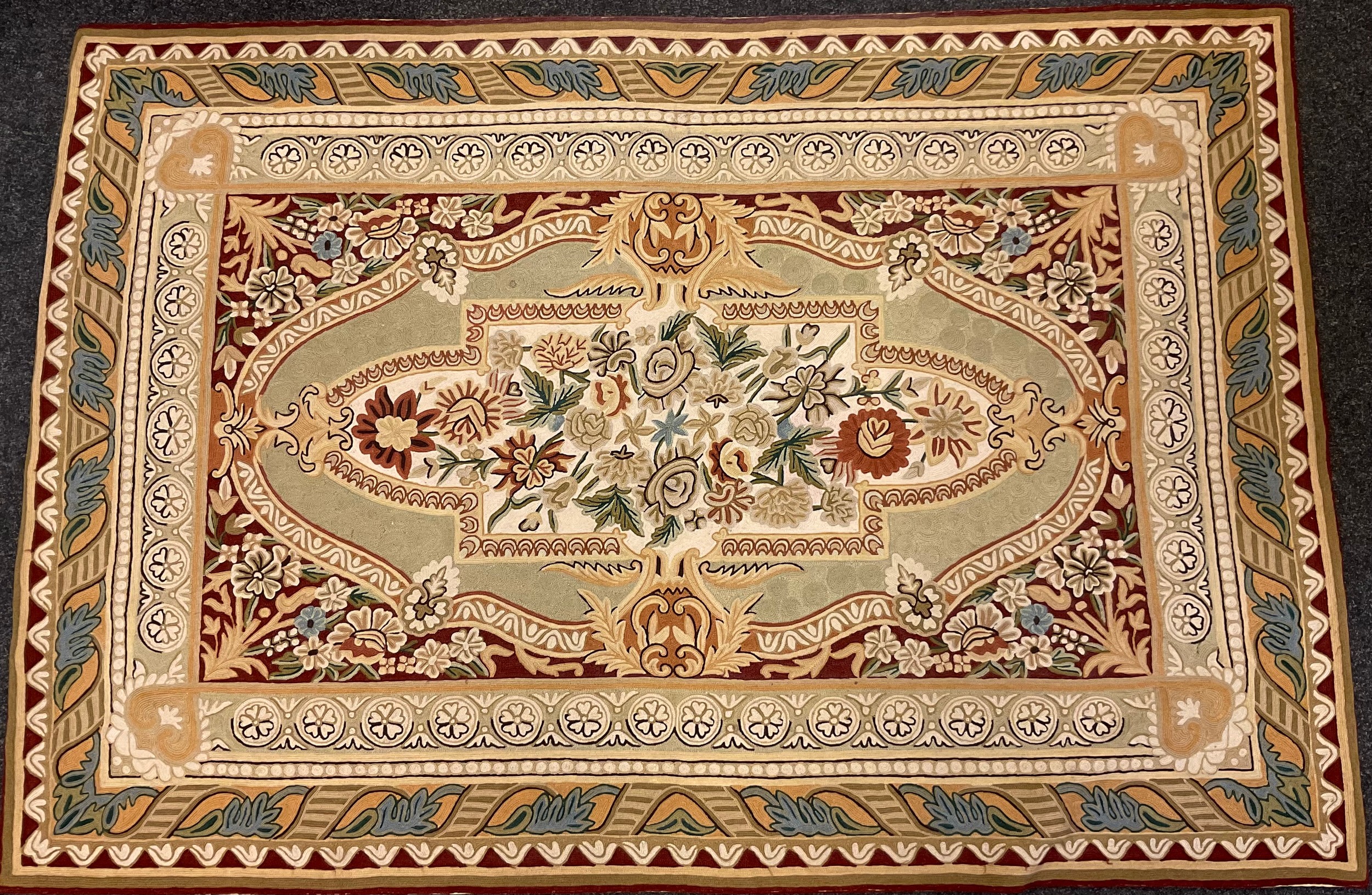 An Aubusson style embroidered rug / wall-hanging, 180cm x 122cm.