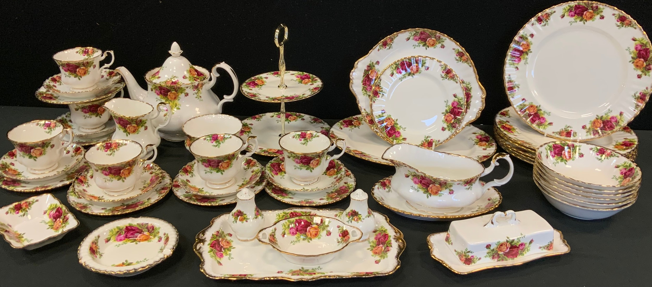 A Royal Albert old Country rose table service, for six inc two tier cake stand, tea pot, cups,