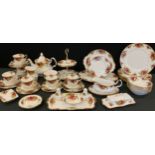 A Royal Albert old Country rose table service, for six inc two tier cake stand, tea pot, cups,