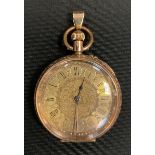 A continental 14ct gold cased lady's fob watch, gilt dial, Roman numerals, button wind movement,