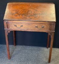 A 20th century mahogany bureau. fall front, fitted interior, tapering legs, 95cm high, 78cm wide,
