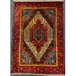 A North-west Persian Senneh, hand-knotted, silk and wool mix rug / carpet, 163cm x 114cm.