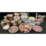 A reproduction Staffordshire type spaniel; two reproduction Mason Ironstone type jugs; imari ware;