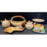 A Clarice Cliff Newport Celtic Harvest basket, the handle with apples and pears, 32cm wide,