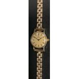 An Omega lady's 9ct gold 1387 wristwatch, 9ct gold bracelet, 16.6g gross; with original leather