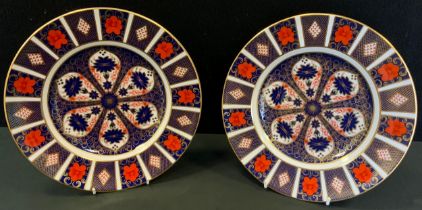 A pair of Royal Crown Derby 1128 Imari dinner plates, 26.5cm diameter, both firsts, printed marks (