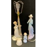 Figures - Lladro lady reading a book; others; Lladro 1989 Christmas Bell; similar unmarked table