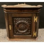 A 19th century small carved oak corner cupboard, 49cm tall x 49cm wide.