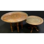 A folding "Benares" tray top table, large silvered copper top, 78cm diameter, on folding base,