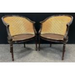A pair of mid 20th century Bergere weave salon tub chairs, (2).