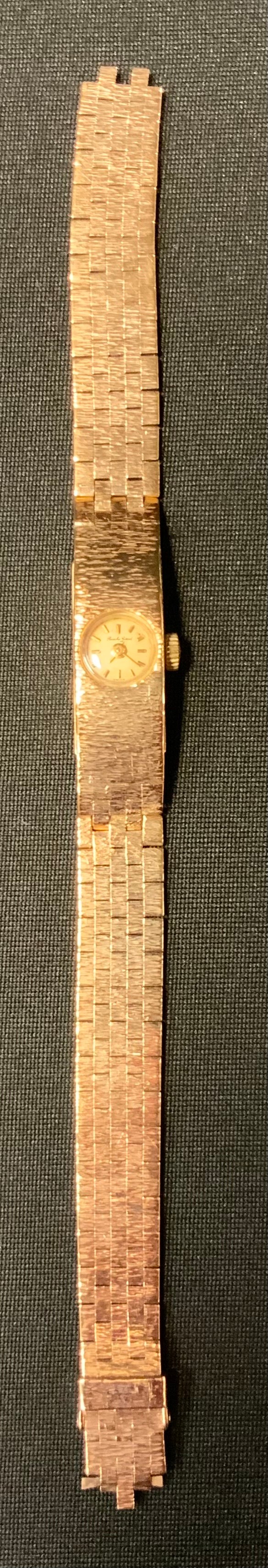 A 1970s Lady's Bueche Girod 9ct gold cases bracelet wristwatch, mechanical movement, 27.3g gross,