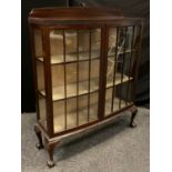 An early 20th century mahogany, bow-front, china display cabinet, quarter galleried back, pair of