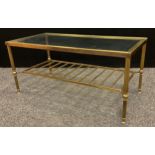 A mid 20th century brass and glass coffee table, 41.5cm tall x 90.5cm wide x 45.5cm deep.