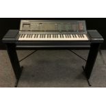 Musical instruments - A Yamaha PSR-6300 electric piano, on stand; a technics keyboard amp, model