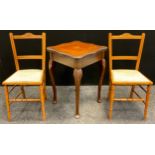 An Edwardian mahogany side table, serpentine edged square top with inlaid patera, and king wood