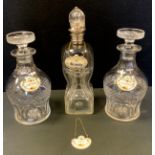 A Victorian silver mounted glug decanter, London 1881; a pair of 19th century cut glass decanters,